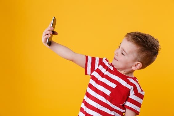 Child taking selfie